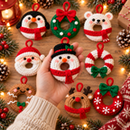 Nine mini crochet Christmas hanging ornaments featuring Penguin, Wreath, Polar Bear, Santa, Reindeer, Candy Cane, Gingerbread, Snowman, and Snowflake