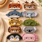 Assorted handmade crochet animal glasses holders displayed together with eyeglasses in colorful character designs