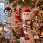 Four personalized crochet spiral ornaments featuring Penguin, Reindeer, Santa Claus, and Gingerbread with custom names