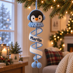 Personalized Penguin crochet spiral ornament with the custom name Martin
