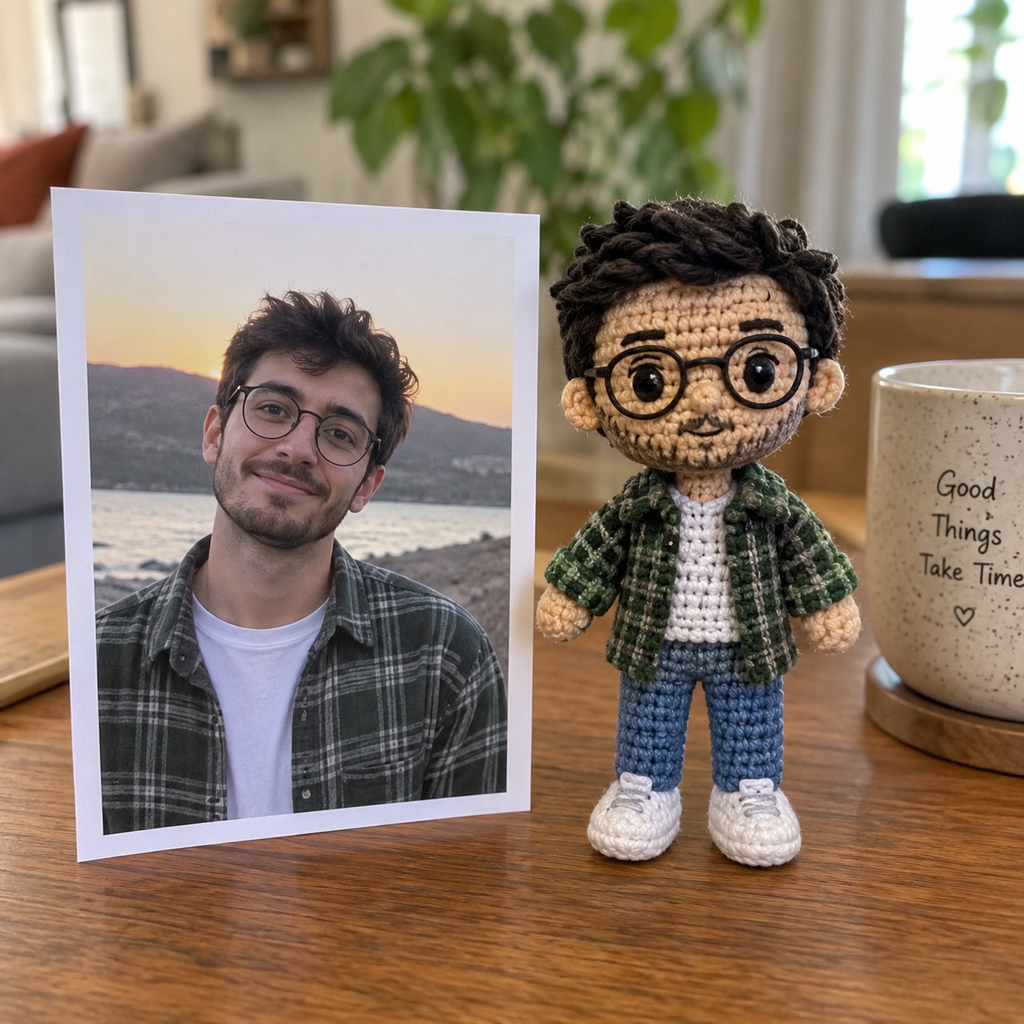 Personalized crochet male portrait doll displayed beside the uploaded reference photo