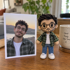 Personalized crochet male portrait doll displayed beside the uploaded reference photo