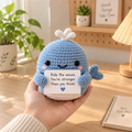 Dolphin amigurumi emotional support character holding a personalized encouragement message
