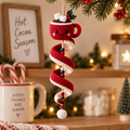 Hot Cocoa Mug crochet spiral Christmas ornament in a cozy holiday kitchen setting