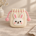 Crochet Bunny drawstring pouch in cream yarn with pink details