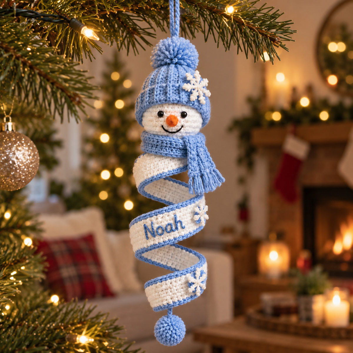 Blue personalized snowman crochet spiral ornament with the custom name Noah