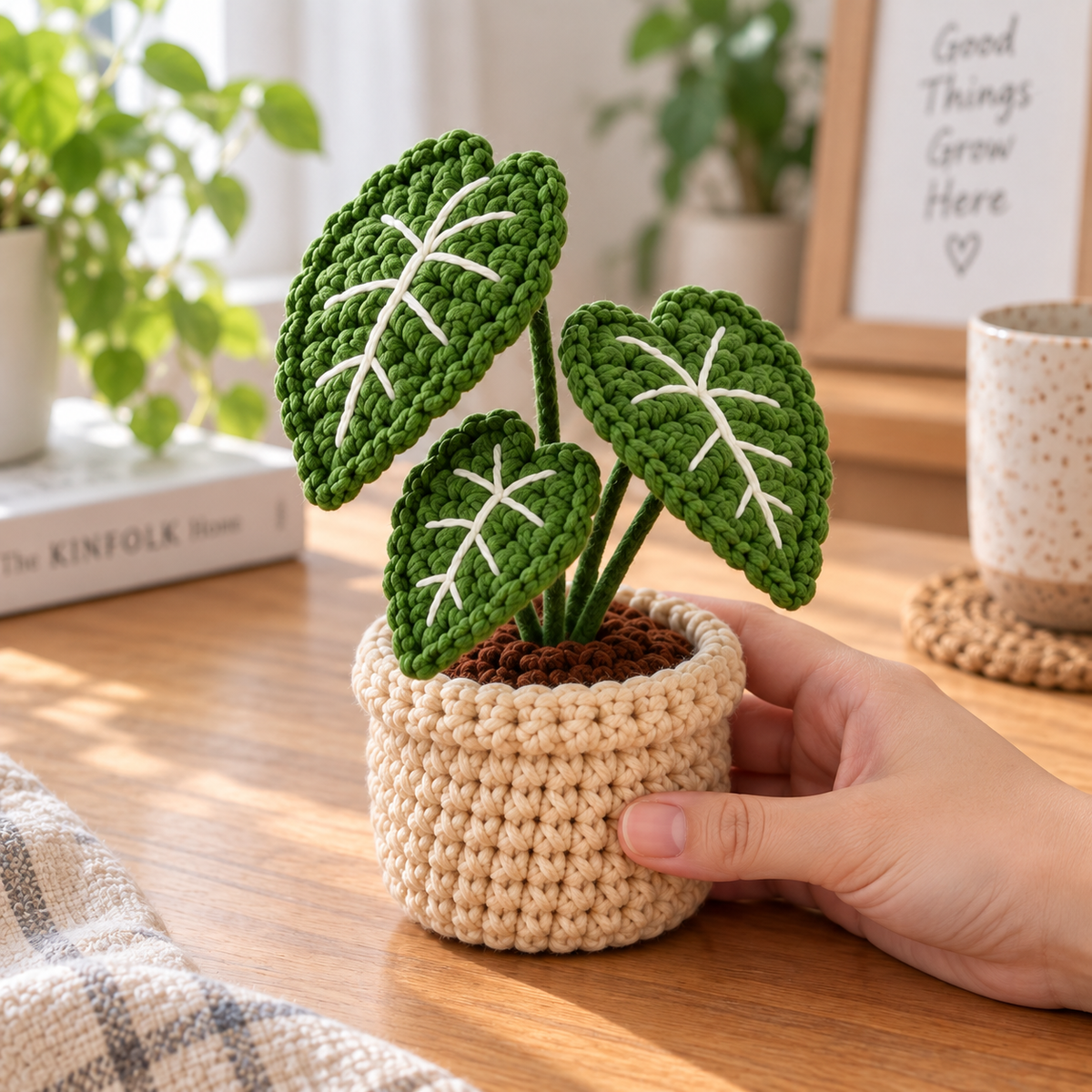 Alocasia crochet plant decor with dark green heart-shaped leaves and light vein details