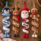 Flat lay of four personalized crochet spiral ornaments with custom name details