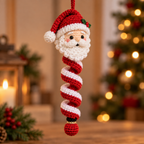 Full-length Santa crochet spiral ornament showing its handmade spiral body and hanging shape