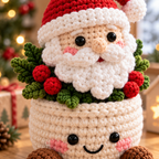 Close-up front view of Santa crochet plant decor in a smiling cream pot