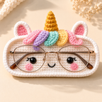 Front view of handmade Rainbow Unicorn crochet glasses holder with pastel rainbow mane, golden horn, and eyeglasses
